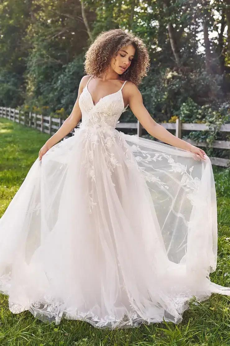 Model wearing a gown by Lillian West